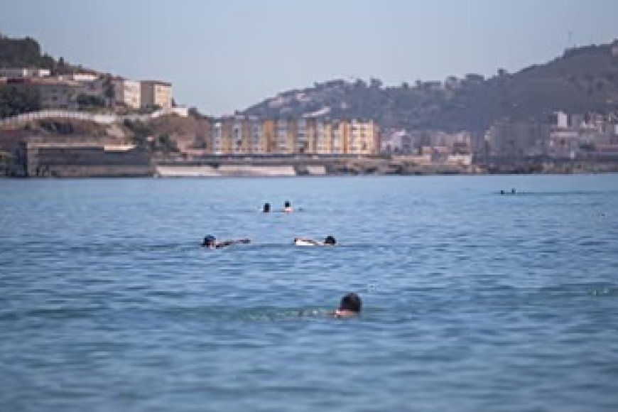 Hundreds of migrants swim from Morocco to Spanish territory
