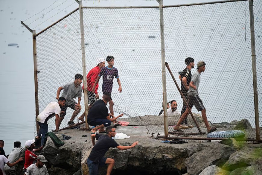 Spain pushes back mass Ceuta border crossing as deaths rise